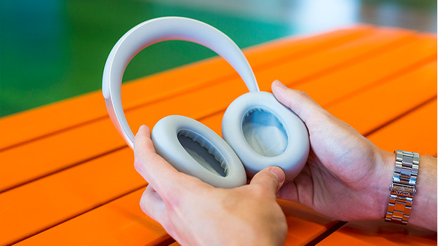 Headphones in hands