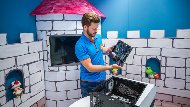 Man holds MSI motherboard