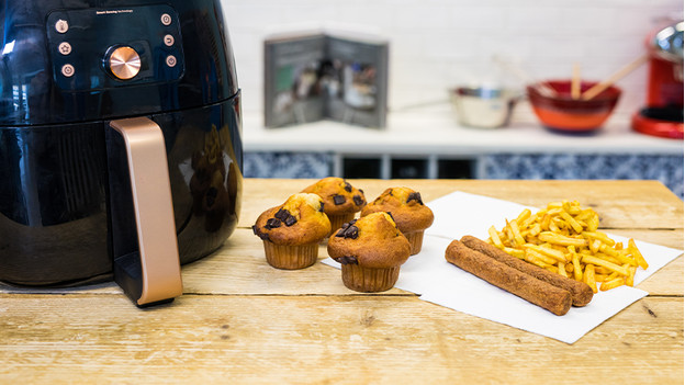 airfryer with fries, snacks, and muffins