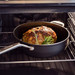 KitchenAid Forged Hardened Aluminum High-sided Skillet with Lid 28cm product in use