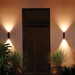 Philips Hue Appear Wall Lamp White and Color Black 3-pack product in use