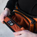 WANDRD Rogue Sling 3L Orange product in use