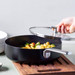 GreenPan Evolution High-sided skillet with lid 26cm Black product in use