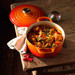 Le Creuset Signature Round Dutch Oven 26cm Flame product in use