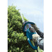 Makita UH5570 product in use