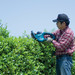 Makita UH4570 product in use