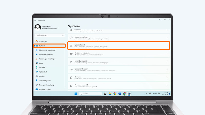 Wähle "System“ und suche nach "Systemwiederherstellung".