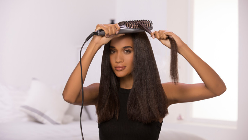 Straighten hair with a straightening brush