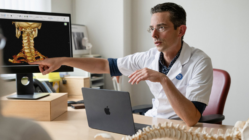 Doctor using a MacBook