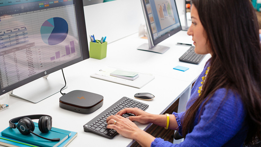 Woman works on Windows PC.