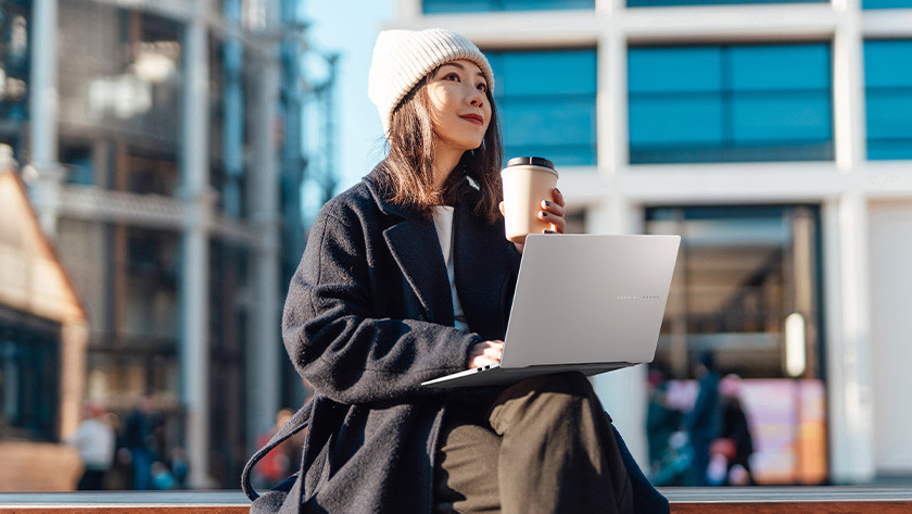 Person working on the go on a laptop.