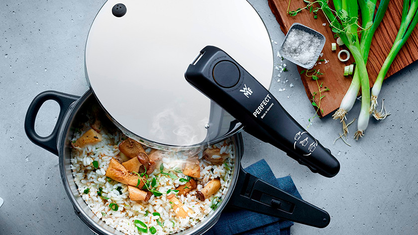 Pressure cooker with rice