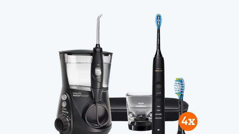 Toothbrush with brush attachments and electric flosser