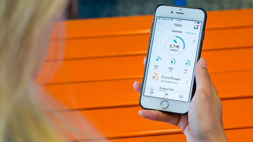 Smartwatches in hand