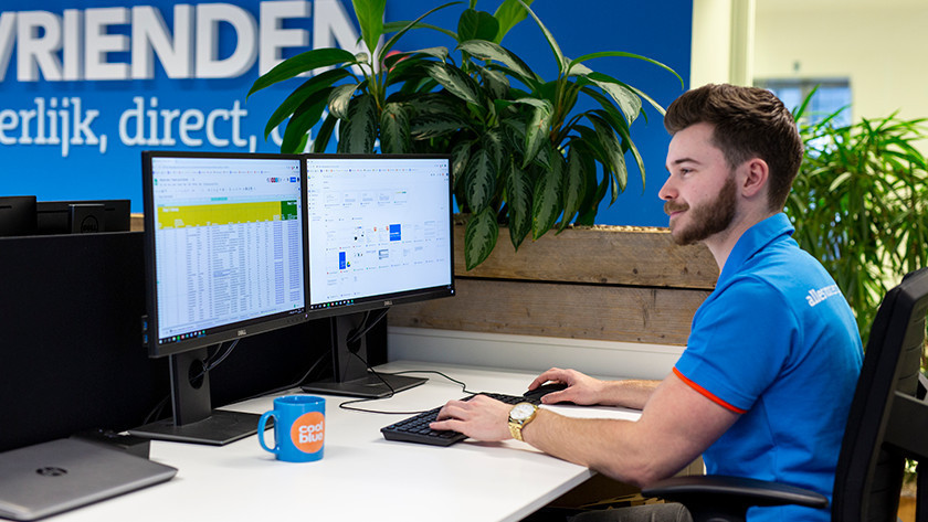 Expert has a properly set up workplace with 2 screens