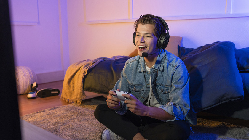 Casual gamer with stereo gaming headset