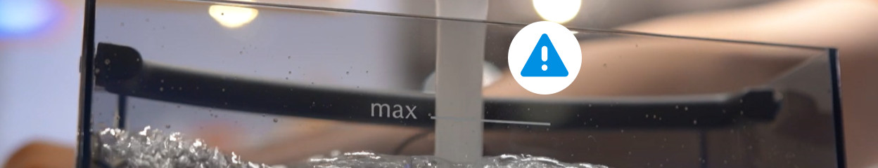 Wie kann man die Meldung "Wassertank auffüllen" am Vollautomaten beheben?