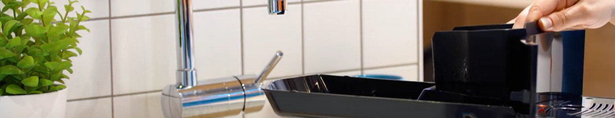 How do you remove the notification 'Empty the coffee grounds tray' on your fully automatic machine?