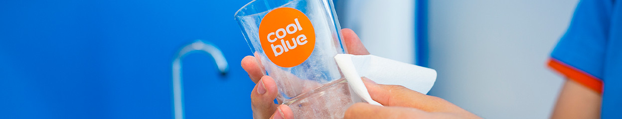 How do you prevent white stains on your glassware?