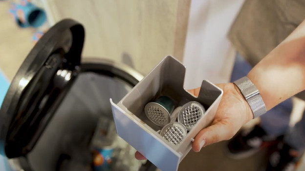 Leere den Auffangbehälter