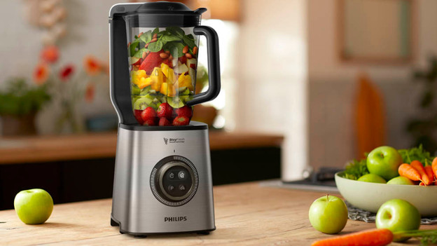 Blender with fruit and vegetables