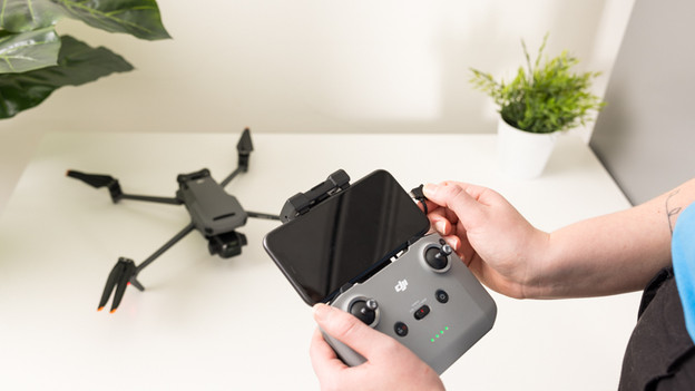 DJI controller phone in holder