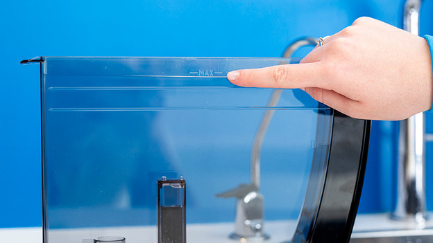 Fill the water tank with tap water up to 'MAX'