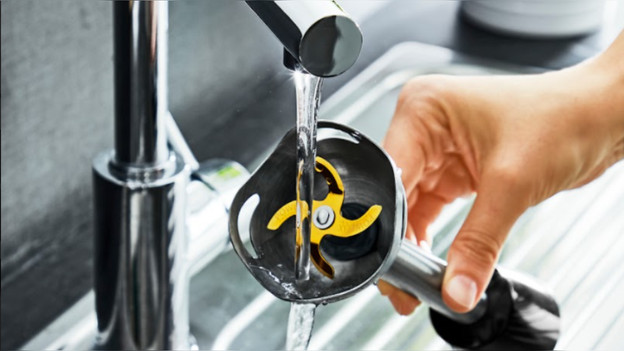 Immersion blender foot under the faucet