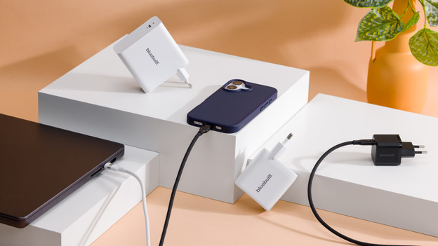 Laptop charging on desk