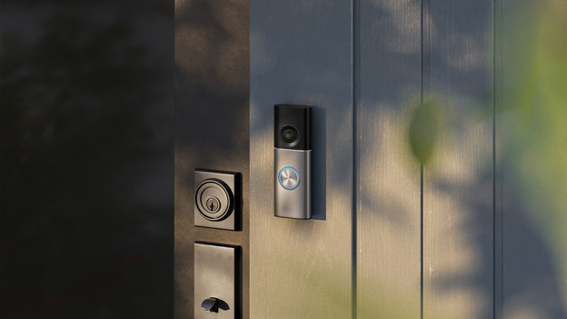 Ring doorbell hangs next to the door