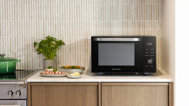 A Wisberg combi microwave on the counter of a kitchen