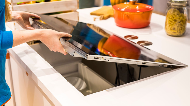 Cooktop being placed into the cutout