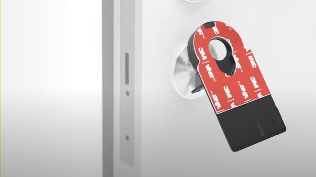 Nuki door lock with adhesive plate