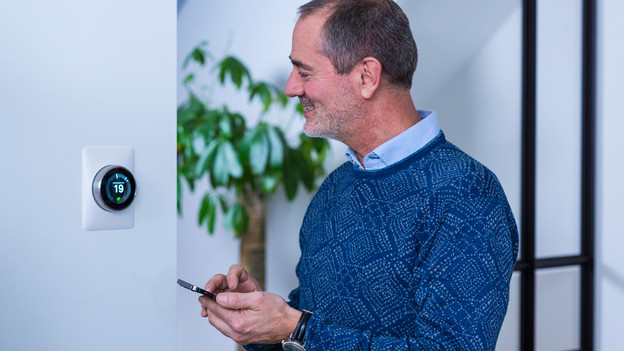 Control a smart thermostat with a smartphone