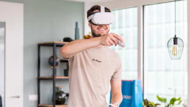 Put on the Meta Quest VR headset and use it