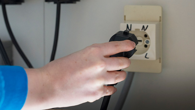 Plug near the socket