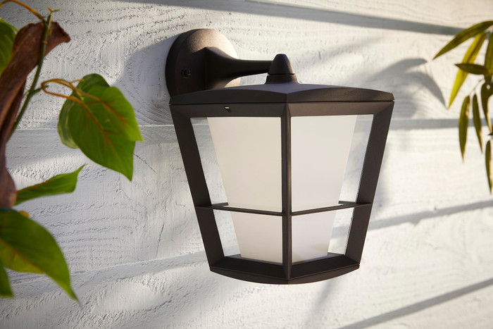 Philips Hue Econic Wall Lamp White and Color Black Hanging product in use