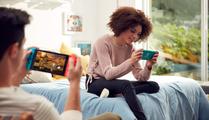Nintendo Switch Lite + Tomodachi Life: Living the Dream product in use