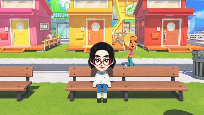 Nintendo Switch Lite + Tomodachi Life: Living the Dream product in use