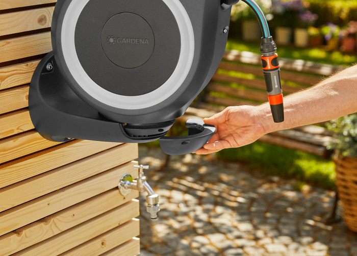 GARDENA Wall Hose Box 15 RollUp S White product in use