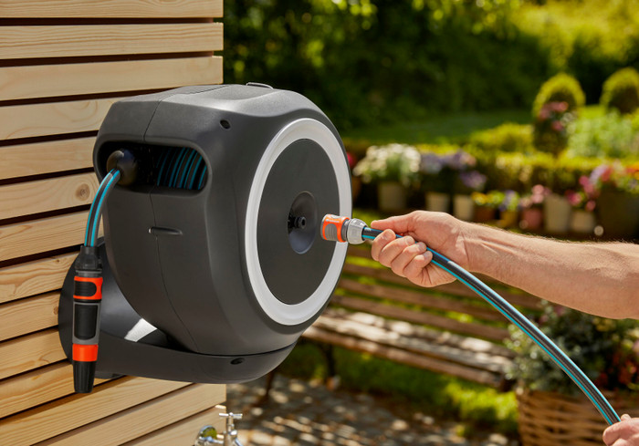 GARDENA Wall Hose Box 15 RollUp S White product in use