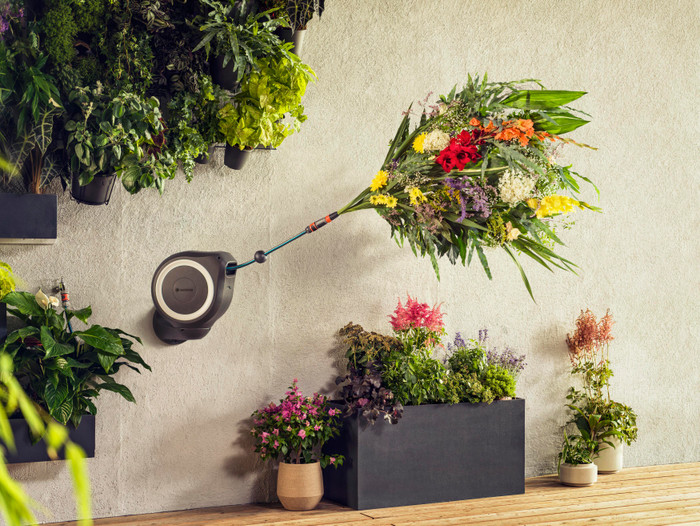 GARDENA Wall Hose Box 15 RollUp S White product in use