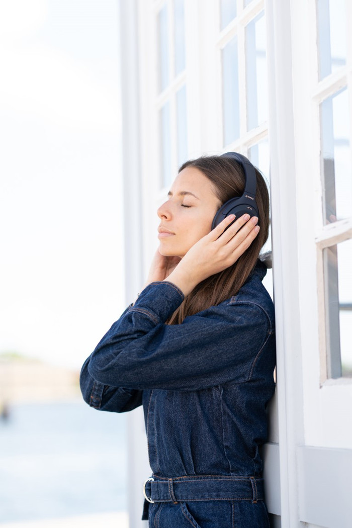 Sony WH-1000XM4 Blue product in use