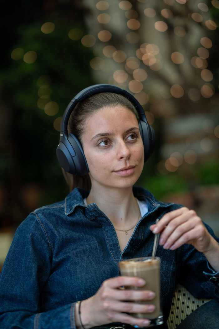 Sony WH-1000XM4 Blue product in use