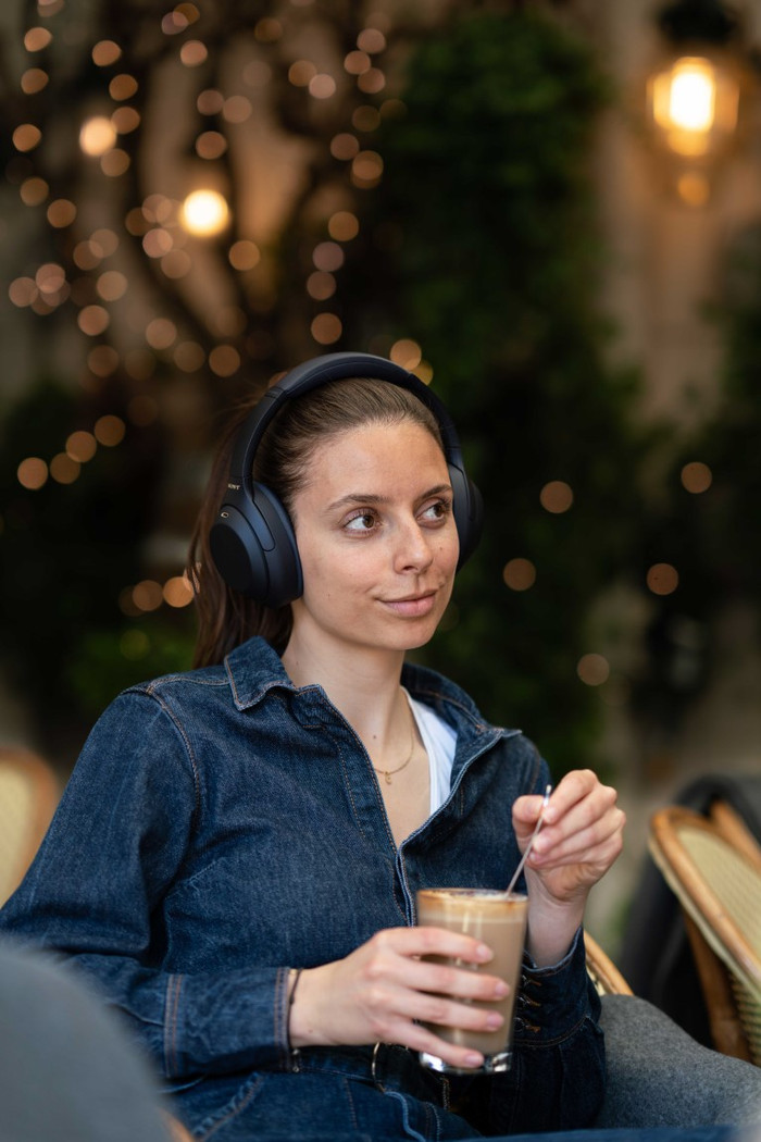 Sony WH-1000XM4 Blue product in use