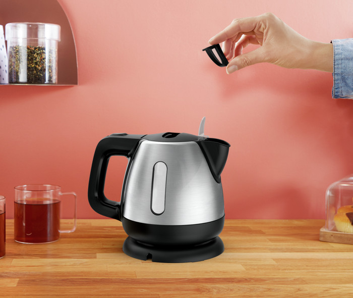 Tefal Mini BI8125 Stainless Steel 0.8L product in use