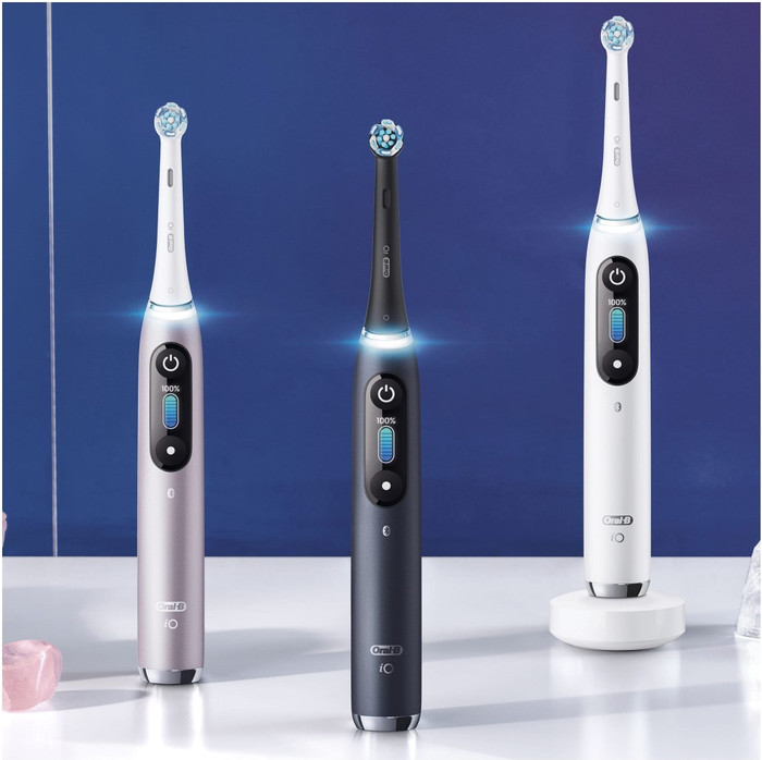 Oral-B iO 9 Holiday Edition with Extra Brush Attachments product in use
