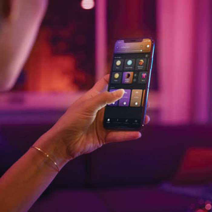 Philips Hue White and Color Starter Pack E27 with 3 Lights + Dimmer + Bridge product in use