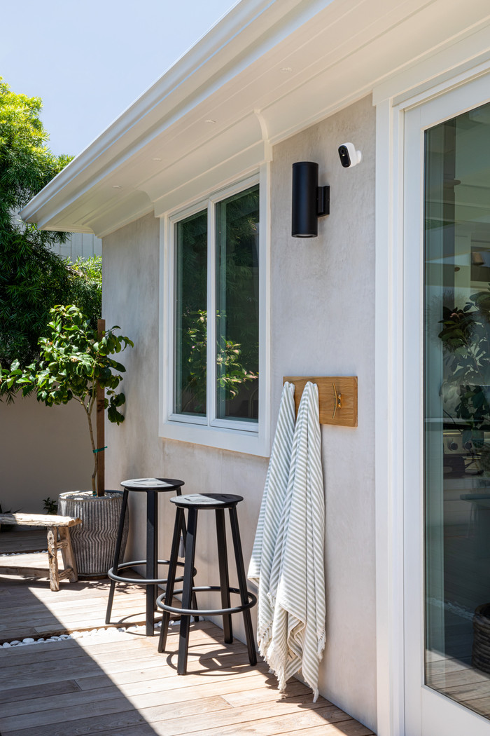 Arlo Essential 2K Outdoor Security Camera 3-pack product in use