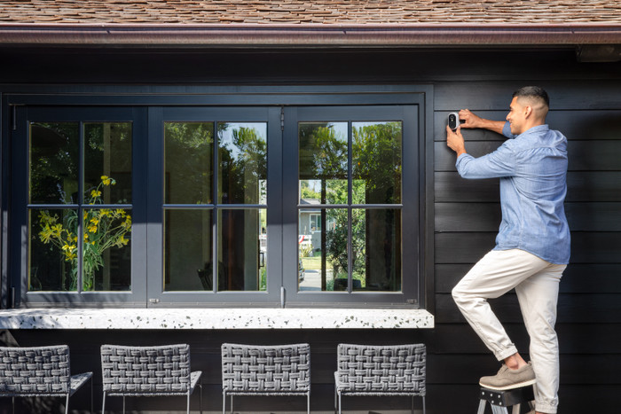 Arlo Essential 2K Outdoor Security Camera 3-pack product in use